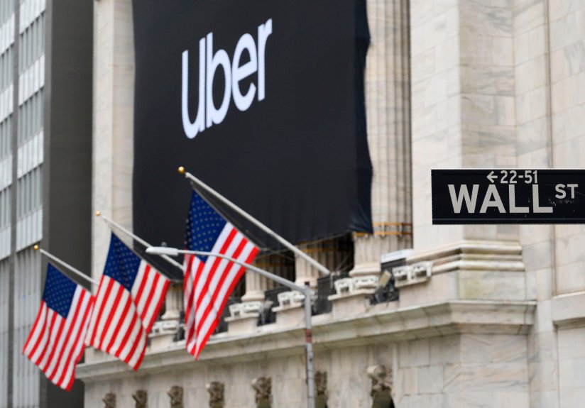 Uber to cut 3,700 jobs as rides plunge