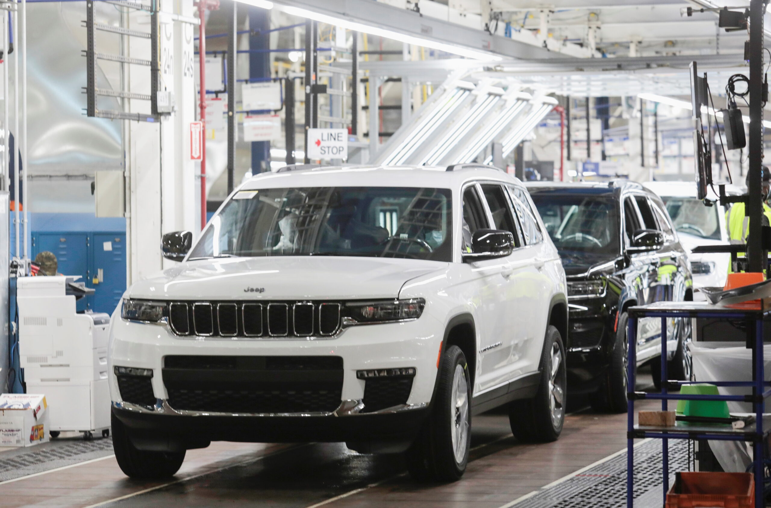 Manufacturer of Jeep attributes job reductions in their Midwest plants to California